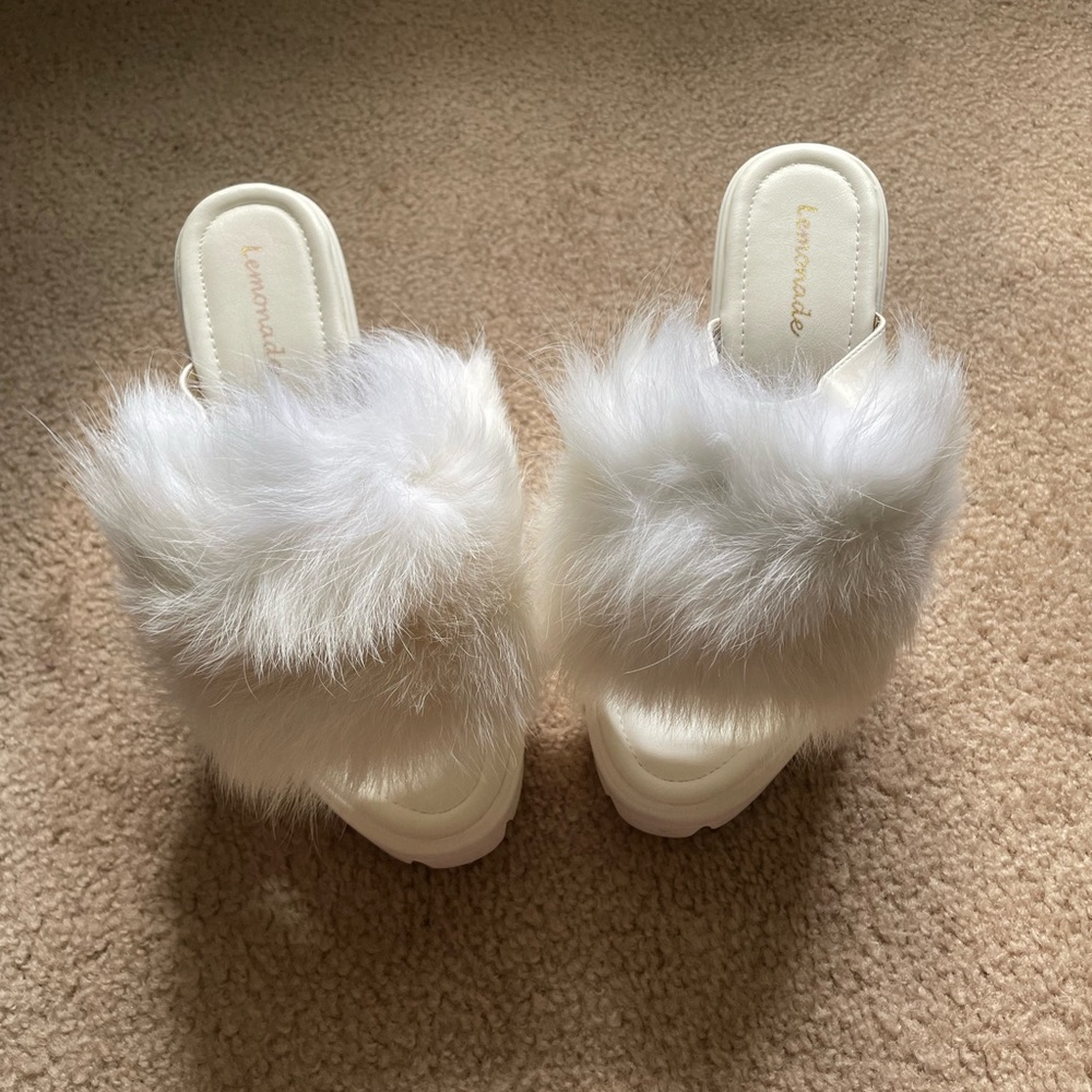 White fluffy platform heels